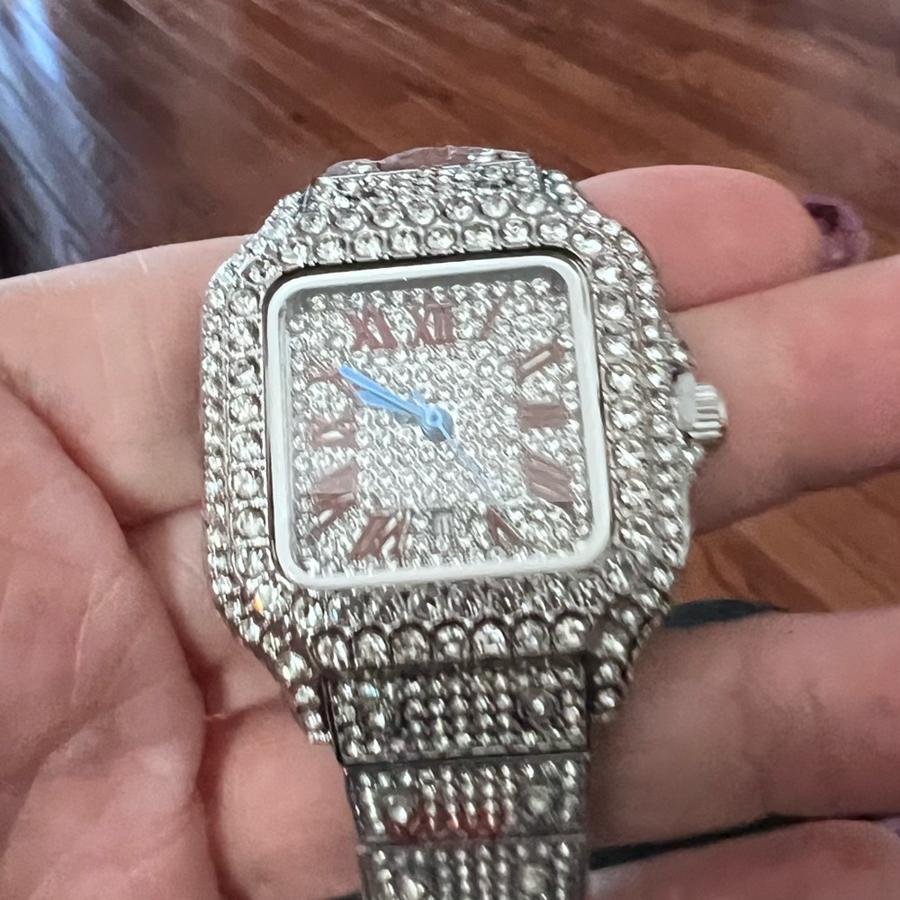 Silver Chrystal Studded Watch for a women or man.